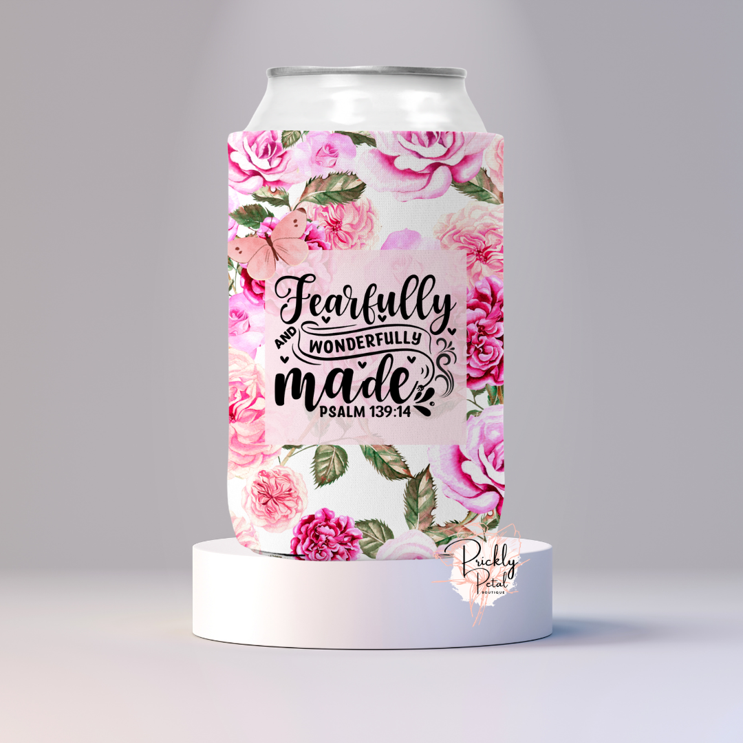 Can with floral design and text on a gray background