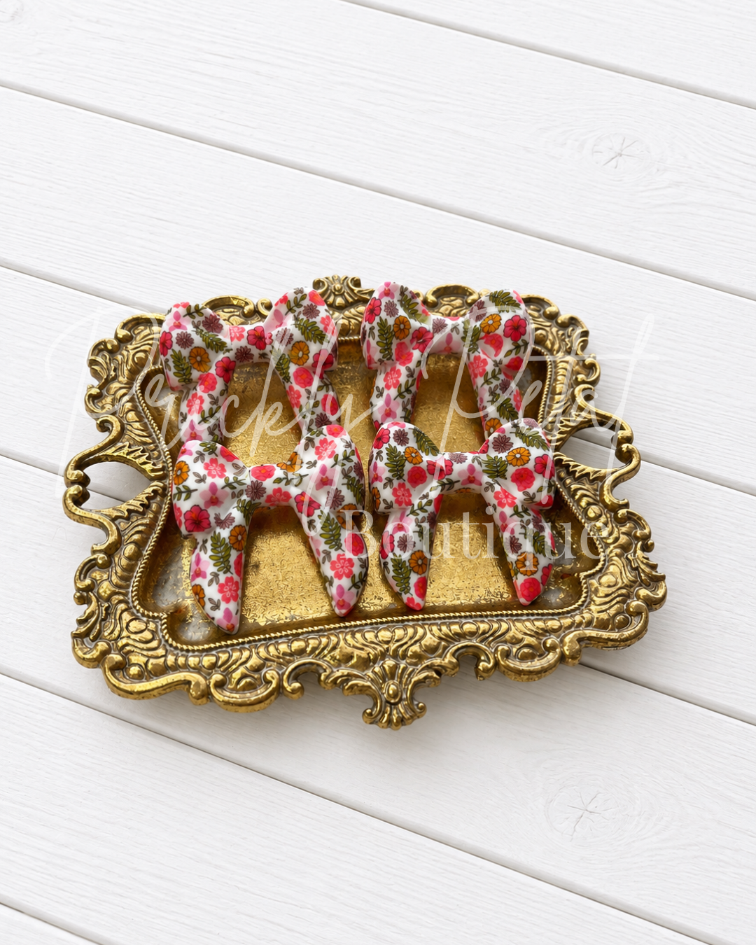 silicone bows on gold tray