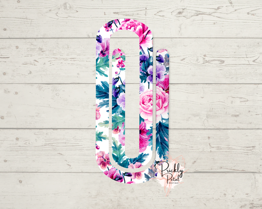 Floral lanyard with pink and blue flowers on a light wooden background