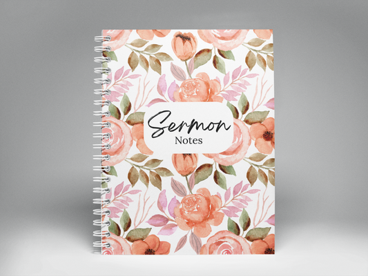 Notebook with floral design and 'Sermon Notes' text on a gray background